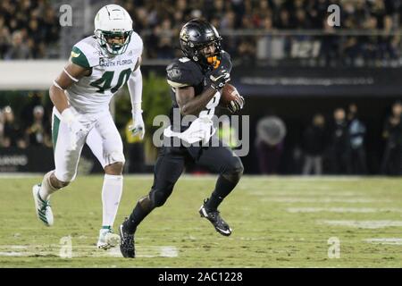 November 29, 2019: UCF Knights running back Adrian Killins Jr. (9) runs with the ball for a touchdown during the NCAA football game between the South Florida Bulls and the UCF Knights held at Spectrum Stadium in Orlando, Florida. Andrew J. Kramer/Cal Sport Media Stock Photo