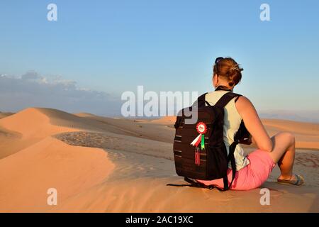 Tourist on the Wahiba Sands desert in Oman beautiful shaped desert dunes Stock Photo