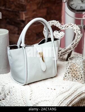 light blue bag with leather fabric and golden detail Stock Photo