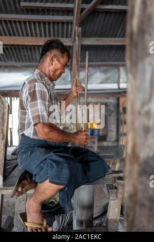 Traditional blacksmith workers on Inle Lake in Myanmar, Asia Stock Photo