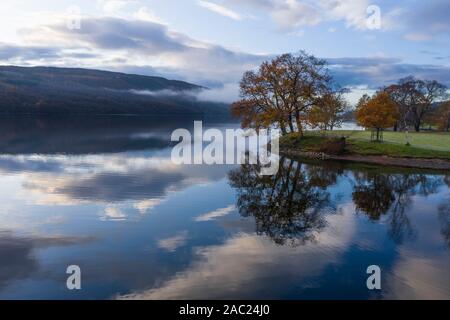 Stunning aerial drone landscape images over Coniston Water at sunrise on beautiful Autumn Fall morning Stock Photo