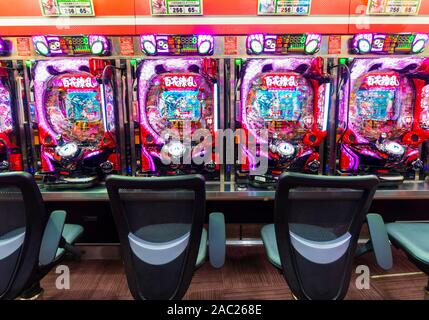 Tokyo, Japan - 12 Oct 2018: A row of Pachinko slot machines inside a Pachinko parlor in Tokyo, Japan. Stock Photo