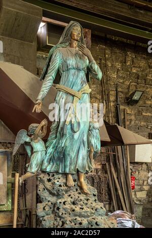 ancient Marinelli foundry, statue of the dusty Madonna Stock Photo