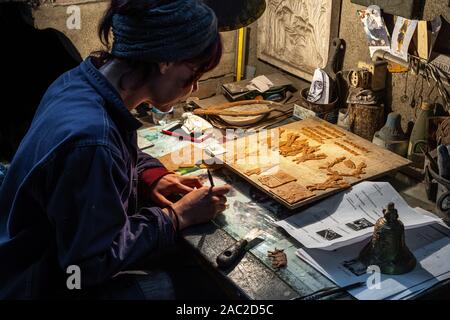 ancient Marinelli foundry, artist carving molds for bells on wax. Agnone Stock Photo