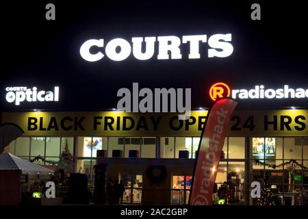 Courts store - last minute preparations the night before black Friday Stock Photo