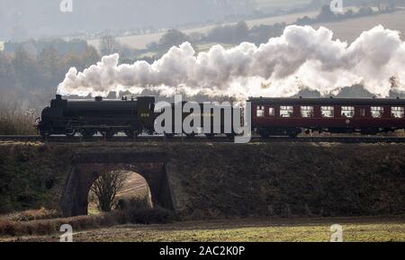 The S15 class steam locomotive 506 travels along the Mid Hants Railway ...