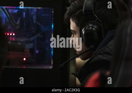 November 29, 2019, Barcelona, Spain: A teenager plays a computer video game during the festival..The NiceOne Barcelona Gaming & Digital Experiences Festival dedicated to the video game industry and virtual reality takes place at the Gran VÃa fairgrounds from Nov 28 to Dec 1, 2019. (Credit Image: © Paco Freire/SOPA Images via ZUMA Wire) Stock Photo