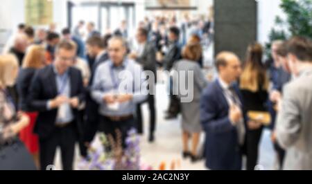 Abstract blured photo of business people socializing during banquet lunch break break at business meetin, conference or event Stock Photo