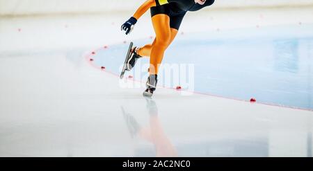 male athlete skater on speed skating competition Stock Photo