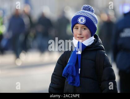 Stamford Bridge, London, UK. 30th Nov, 2019. English Premier League Football, Chelsea versus West Ham United; Young Chelsea fan arriving at Stamford Bridge - Strictly Editorial Use Only. No use with unauthorized audio, video, data, fixture lists, club/league logos or 'live' services. Online in-match use limited to 120 images, no video emulation. Credit: Action Plus Sports/Alamy Live News Stock Photo