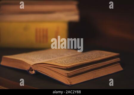 an open book on the wooden desk Stock Photo