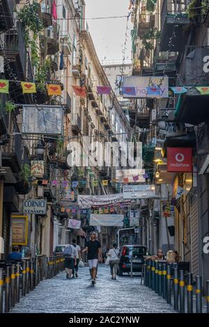 Naples, Italy - August 15, 2019: City street with residents balcony in historic center Stock Photo