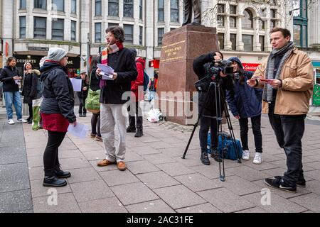 CARDIFF, United Kingdom. 30th Nov, 2019. Anti-Tory leaflet distribution organised by The Cardiff People's Assembly and Stand Up to Racism Cardiff at the Aneurin Bevan statue on Queens Street in Cardiff, Wales. © Credit: Matthew Lofthouse/Alamy Live News Stock Photo