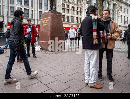 CARDIFF, United Kingdom. 30th Nov, 2019. Anti-Tory leaflet distribution organised by The Cardiff People's Assembly and Stand Up to Racism Cardiff at the Aneurin Bevan statue on Queens Street in Cardiff, Wales. © Credit: Matthew Lofthouse/Alamy Live News Stock Photo