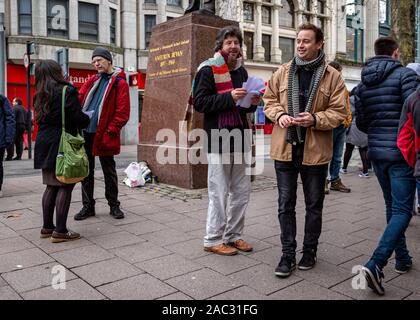 CARDIFF, United Kingdom. 30th Nov, 2019. Anti-Tory leaflet distribution organised by The Cardiff People's Assembly and Stand Up to Racism Cardiff at the Aneurin Bevan statue on Queens Street in Cardiff, Wales. © Credit: Matthew Lofthouse/Alamy Live News Stock Photo