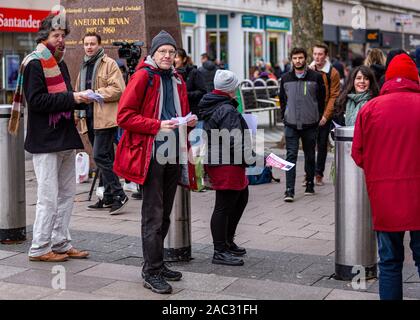 CARDIFF, United Kingdom. 30th Nov, 2019. Anti-Tory leaflet distribution organised by The Cardiff People's Assembly and Stand Up to Racism Cardiff at the Aneurin Bevan statue on Queens Street in Cardiff, Wales. © Credit: Matthew Lofthouse/Alamy Live News Stock Photo