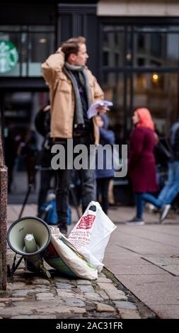 CARDIFF, United Kingdom. 30th Nov, 2019. Anti-Tory leaflet distribution organised by The Cardiff People's Assembly and Stand Up to Racism Cardiff at the Aneurin Bevan statue on Queens Street in Cardiff, Wales. © Credit: Matthew Lofthouse/Alamy Live News Stock Photo