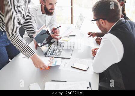 Sharing ideas. Team workers have meeting and talking about planning their business Stock Photo