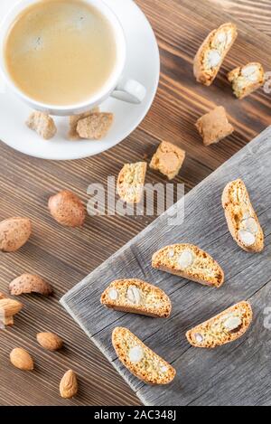 Cup of coffee with cantuccini cookies flat lay Stock Photo