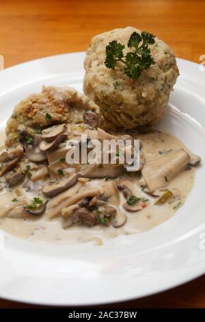 Homemade bread dumpling with mushroom ragout Stock Photo