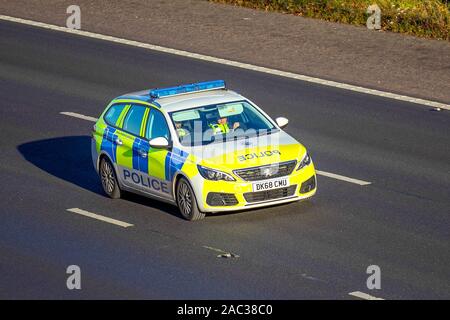 2019 Peugeot 308 Access SW Blue HDI S; UK Motorway Police Vehicular traffic, transport, modern vehicles, saloon cars, vehicles, vehicle, uk roads, motors, motoring south-bound on the 3 lane M61 motorway highway Stock Photo