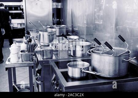 Typical kitchen of a restaurant in operation, toned image Stock Photo