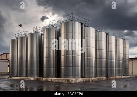 Stainless steel wine barrels in the winery Stock Photo