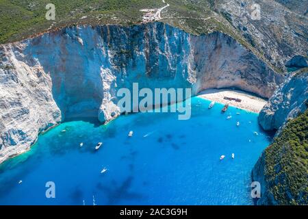 Aerial drone shot of Zakynthos Navagio beach with observation deck on cliff and yachts in summer Stock Photo