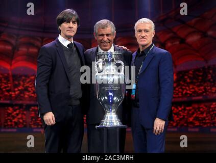 Germany manager Joachim Low (left), Portugal manger Fernando Santos (centre) and France manager Didier Deschamps during the Euro 2020 Draw at the Romexpo Exhibition Centre, Bucharest. Stock Photo