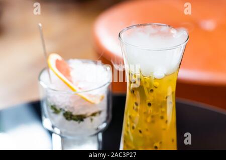 Steam is Coming Out from Passion Fruit Juice. Refreshing Summer Drink. Stock Photo