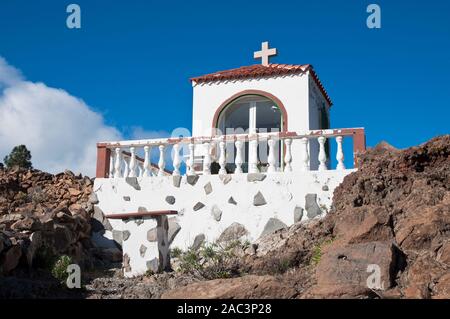 Small white Greek-orthodox chapel on a hill on the island of Rhodos Stock Photo