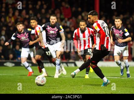 London, UK. 30th Nov, 2019. Brentford's Said Benrahma scoring from spot kick 6th goal for his team during the Sky Bet Championship match between Brentford and Luton Town at Griffin Park, London, England on 30 November 2019. Photo by Andrew Aleksiejczuk/PRiME Media Images. Credit: PRiME Media Images/Alamy Live News