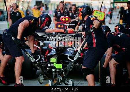 Red Bull Racing’s Dutch driver Max Verstappen returns to pits during the third practice session of the Abu Dhabi F1 Grand Prix at the Yas Marina Circuit in Abu Dhabi. Stock Photo