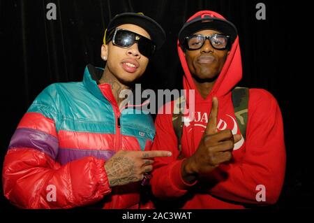 Rapper Tyga (l) backstage at the Roxy on March 25, 2009 in West Hollywood, California. Stock Photo