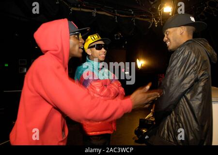 Tyga (c) and GaTa (r) backstage at the Roxy on March 25, 2009 in West Hollywood, California. Stock Photo