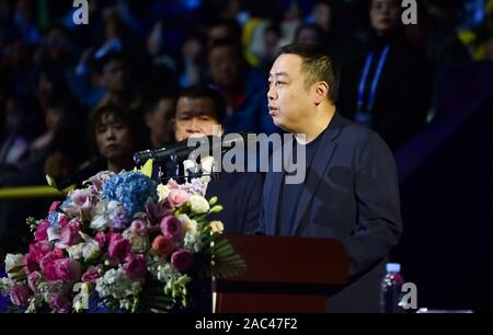 Liu Guoliang, retired Chinese table tennis player who has won all titles at major world tournaments, speaks at the opening ceremony of 2019 International Table Tennis Federation (ITTF) Men's World Cup in Chengdu city, southwest China's Sichuan province, 30 November 2019. 2019 International Table Tennis Federation (ITTF) Men's World Cup kicked off in Chengdu city, southwest China's Sichuan province, 30 November 2019. Stock Photo