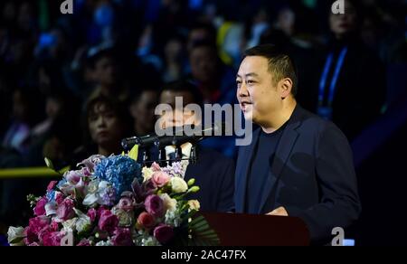 Liu Guoliang, retired Chinese table tennis player who has won all titles at major world tournaments, speaks at the opening ceremony of 2019 International Table Tennis Federation (ITTF) Men's World Cup in Chengdu city, southwest China's Sichuan province, 30 November 2019. 2019 International Table Tennis Federation (ITTF) Men's World Cup kicked off in Chengdu city, southwest China's Sichuan province, 30 November 2019. Stock Photo