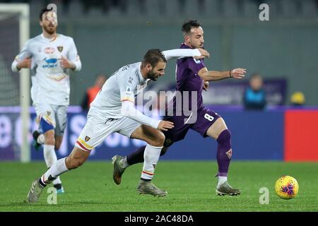 Florence, Italy. 30th Nov, 2019. Gaetano Castrovilli of ACF Fiorentina and Panagiotis Tachtsidis of US Lecce during the Serie A match between Fiorentina and Lecce at Stadio Artemio Franchi, Florence, Italy on 30 November 2019. Photo by Luca Pagliaricci. Editorial use only, license required for commercial use. No use in betting, games or a single club/league/player publications. Credit: UK Sports Pics Ltd/Alamy Live News Stock Photo