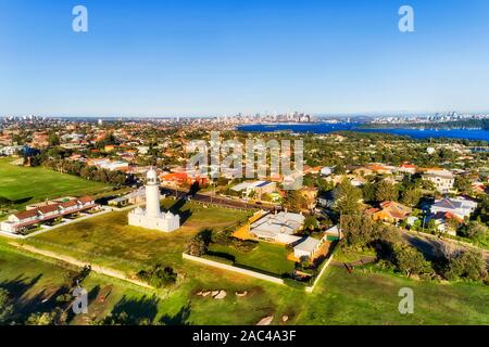 Green lawns of Macquarie lighthouse site - the first stone lighthouse in Australia guarding the entrance to Sydney harbour. Elevated aerial view towar Stock Photo