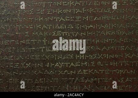 Ancient Greek text of roman law on a bronze Heraclean Tablets from Heraclea Lucania. Italy Stock Photo