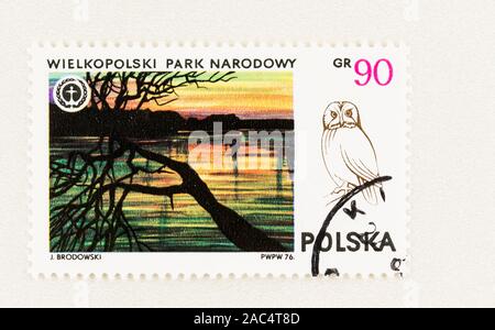 SEATTLE WASHINGTON - October 9, 2019: Polish postage stamp with Wielkopolski National Park and owl issued in 1976. Scott # 2159. Stock Photo