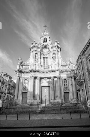 CATANIA, ITALY - APRIL 7, 2018: The baroque facade of church Basilica Collegiata. Stock Photo