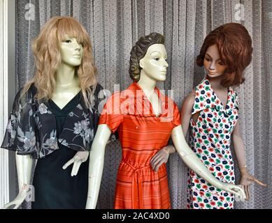 mannequins on display in an old shop window in Glen Innes in northern new south wales, australia, dressed in period clothes and wigs Stock Photo