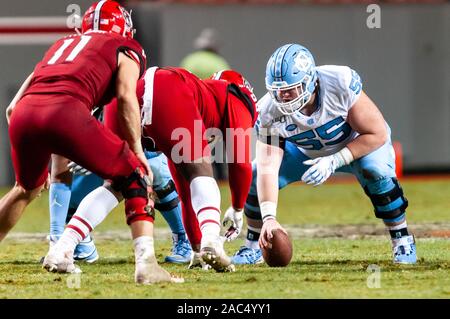 Raleigh, North Carolina, USA. 30th Nov, 2019. Nov. 30, 2019 - Raleigh, North Carolina, USA - North Carolina Tar Heels offensive lineman Ty Murray (55) in action during Saturday's game between the NC State Wolfpack and University of North Carolina Tar Heels. The Tar Heels defeated the Wolfpack, 41-10. Credit: Timothy L. Hale/ZUMA Wire/Alamy Live News Stock Photo