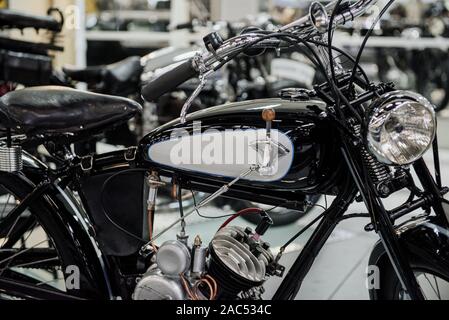 SINSHEIM, GERMANY - OCTOBER 16, 2018: Technik Museum. Classical black motorbike stands indoors at the vehicle exhibition Stock Photo
