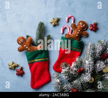 Felt gingerbread man in socks Stock Photo