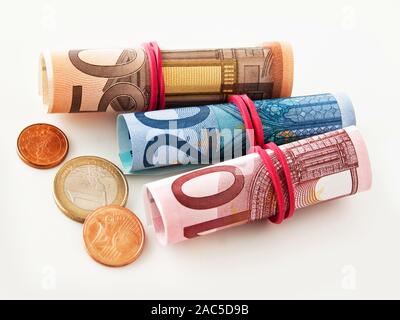 Euro coins and banknotes on white background Stock Photo