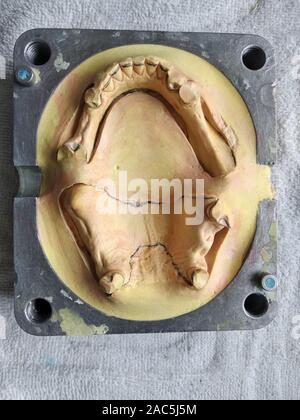 dental cuvette for packaging and manufacturing removable dentures Stock Photo