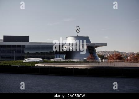 STUTTGART, GERMANY - OCTOBER 16, 2018: Mercedes Museum. Great silver colored building with big metallic logo on the top Stock Photo