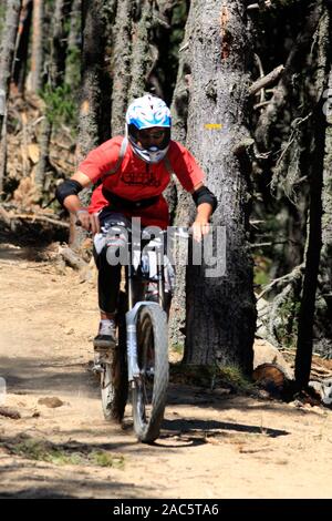 Descent by bike in the ski resort of Les Angles resort in summer, Pyrenees-Orientales, Occitanie France Stock Photo